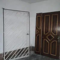 درب چوبی و گارد آهنی