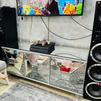 میز تلویزیون.جلو‌مبلی.ساعت.کنسول و قاب عکس آینه ای