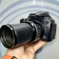 دوربین عکاسی و فیلمبرداری Canon SX40+کیف و سه‌پایه
