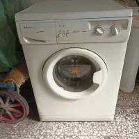 لباس شویی آبسال