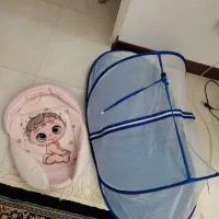 پشه بند نوزاد و قنداق سوییسی