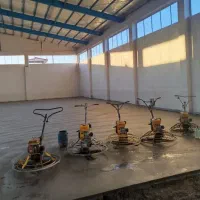 بتن ریزی کف با ماله پروانه ای