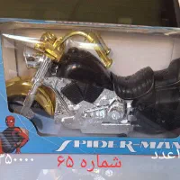 فروش ماشینهای اسبابازی وعروسک و تفنگ