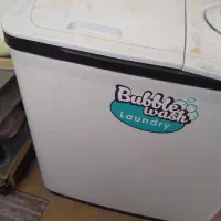 یک لباس شوی نیم سوز نه کیلوی