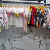 پوشاک بچه گانه|کفش و لباس بچه|شیراز, لب آب|دیوار