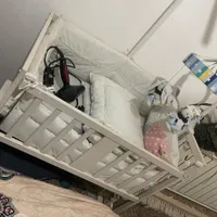 گهواره کنار تخت مادر