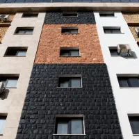 سنگ نما درجه یک تراورتن شکلاتی، سفید، گرانیت