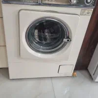 لباسشویی اتوماتیک و میز پینگپنگ