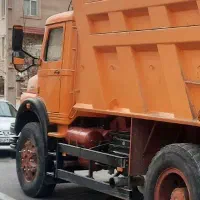 راننده بیل مکانیکی چرخ لاستیکی ماهر