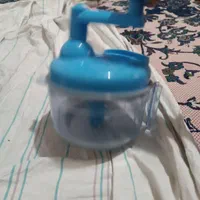 سبزی خردکن و آبمیوه گیری دستی. سطل