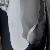 یک ست کامل کت و شلوار و کفش و کراوات قهوه ای