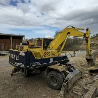 بیل کوماتسو لاستیکی 200|خودرو سنگین|ارژن, |دیوار