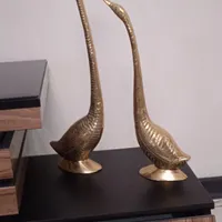 قو بزرگ برنجی