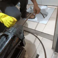 لوله بازکنی تخلیه چاه با پمپ لجنکش ژنراتور آلمانی