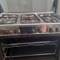 اجاق گاز  تمام استیل کار کرده