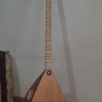 یک عدد ساز بادی  باغلاما دسته کوتاه حرفه ایی