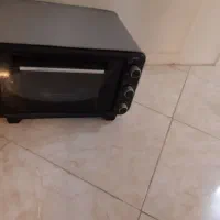 آون توستر همراه با جوجه گردان