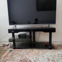 میز تلویزیون شیشه‌ای