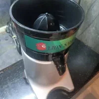 آب مرکبات گیری انار و پرتقال