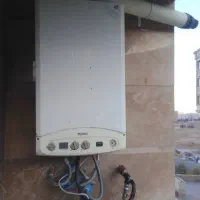 تصفیه آب پکیج رادیاتور اسپلیت|آبگرمکن، پکیج، شوفاژ|شیراز, باغ تخت|دیوار