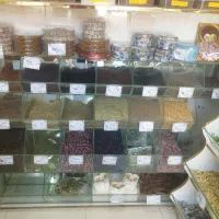 قفسه شیشه ای آجیل پاستیل زرشک ونبات وبذریجات