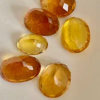 فروش سنگ  توپاز طلایی بارخونه ۱۰۶ قیراط