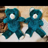 عروسک خرس. جادستمال کاغذی و سطل