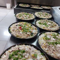 با خرید فقط یک پیتزا دو پیتزا ببرید