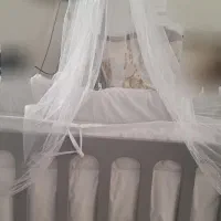 تخت کودک همراه با تور پشه بند