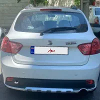 کوییک r مدل ۱۴۰۰ سفید و مشکی پارس خودرویی