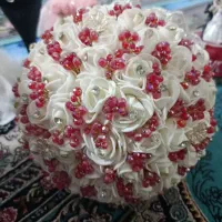 دسته گل عروس ولیوان عروس داماد کاملانو