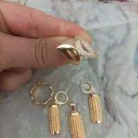 یک عدد نیم ست و دوتا انگشتر که نو همشون کلی