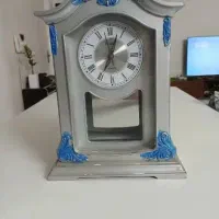 ساعت هم دیواری هم رو میزی