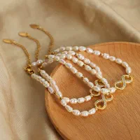 دستبند بینهایت مروارید پرورشی و تیتانیوم|بدلیجات|تهران, اقدسیه|دیوار