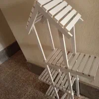 یک عدد جای گلدان چند طبقه ویک عدد هم میله بارفیکس