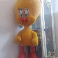 عروسک  بزرگ  و کفش زنانه
