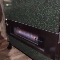 بخاری گازی سالم و پنجره رومی