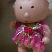 عروسک|اسباب‌بازی بچه|قم, باغ شریفی|دیوار