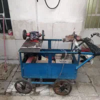 گاری دستی با وسایل چاقو تیز کنی