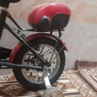 دوچرخه ۱2 قرمز تمیز و کاملآ سالم|دوچرخه، اسکیت، اسکوتر|اصفهان, شهید رجایی|دیوار