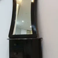 ایینه کنسول و ساعت ایستاده هردو باهم