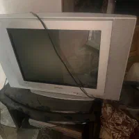 تلوزیون سامسونگ با میز و دستگاه سی دی