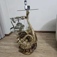 ساعت ایستاده و میز تلفن