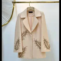 منجوق دوزی روی لباس