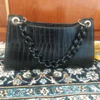 کیف|کیف، کفش، کمربند|مسجد سلیمان, |دیوار