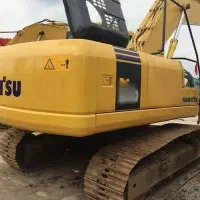 بیل مکانیکی و کمپرسی