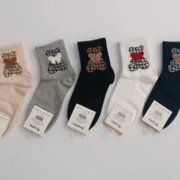 جوراب بالا زانو گندمی|لباس|قم, بنیاد|دیوار