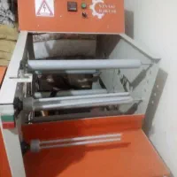 دستگاه رول کن سفره یکبار مصرف
