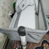 گهواره کنار تخت مادر