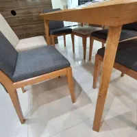 میز ناهارخوری ۶ نفره با صندلی های طوسی کرم